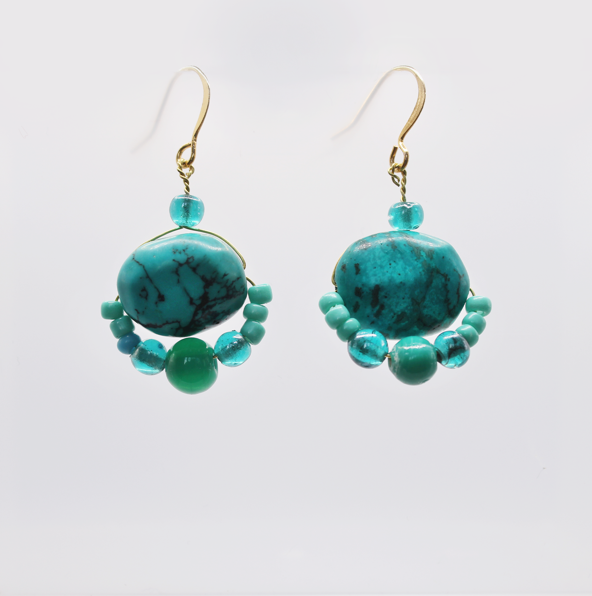 Handmade earrings with Turquoise howlite and vintage glass beads.
